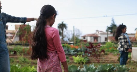 Poster - Indian family gardening together at house organic garden outdoor - Vegetarian, healthy food and education concept 