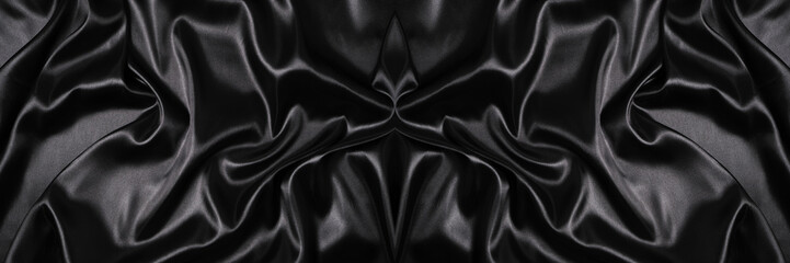 Banner, abstract background of black silk fabric.
