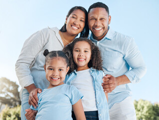 Poster - Nothing is more important than spending time with your family. Shot of a couple standing outside with their two daughters.