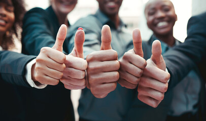 Poster - Were right there with you. Cropped shot of a group of unrecognizable businesspeople showing a thumbs up.