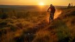 Ein Mountaibiker fährt im Sonnenuntergang durch die Landschaft, generative AI