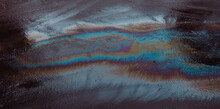 Oil Slicks On Wet Asphalt