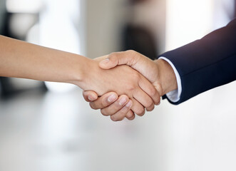 Poster - We should shake on that. Shot of two unrecognizable businesspeople shaking hands at work.