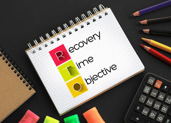 Poster - RTO Recovery Time Objective - amount of real time has to restore its processes at an acceptable service level after a disaster, acronym text on notepad