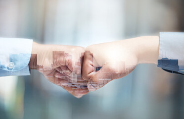 Poster - In it to win it. Shot of two unrecognizable businesspeople giving a fist bump outside.