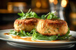 © olindana - Freshly made deliciious fried crab cakes on a bed of green arugula served on a plate. Traditional food of American cuisine. Whole food balanced diet concept