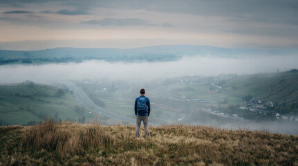 person walking above the fog