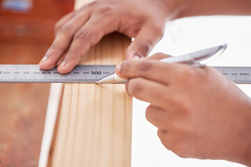 Sticker - Im cutting off the rest. Cropped shot of a carpenter doing measurements on wood.