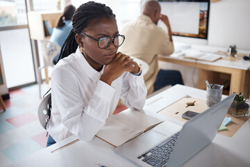 Poster - Ready to take on this day. Shot of a young businesswoman using a laptop in a modern office.