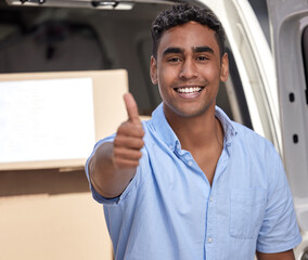 Poster - All good to go. Portrait of a young delivery man showing thumbs up while loading boxes from a van.