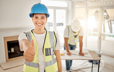 Sticker - Your living space is going to look great. Shot of an attractive young construction worker standing inside and making a thumbs up gesture.