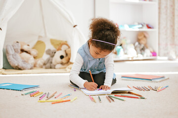 Sticker - She is a little star and my life. Shot of a little girl relaxing and drawing at home.