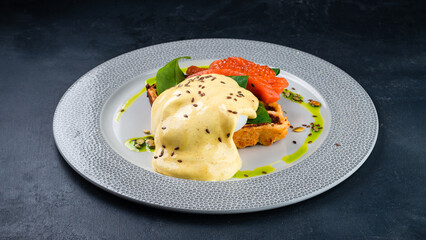 Poster - Waffle with poached egg, salmon, red caviar, spinach and sauce.