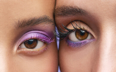 Sticker - Look us in the eye and say you dont like purple. Cropped shot of two young women wearing purple make-up.