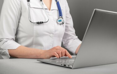 Poster - Doctor hands types, works at laptop computer, using information technologies, chatting with patients online