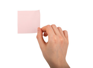 Wall Mural - Hand holding pink sticky notes, blank memo sticker isolated on white