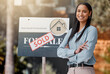 © Jesse B/peopleimages.com - Proud, confident, always on call. Shot of a real estate agent standing next to a sold sign outside.