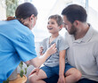 © Lumeez/peopleimages.com - Youve got the heart of a lion. Shot of a female doctor doing a checkup on a sick little boy at home.