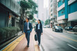 © VisualProduction - Business man and woman walking in business district in Dubai. Big city modern lifestyle, working in busy district. Generative AI