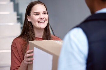 Poster - Spreading joy to everyone around. Shot of a woman accepting her delivery from the delivery man.