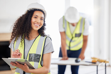 Poster - This place is going to look amazing when were done. Shot of an attractive young contractor standing inside and using a clipboard.