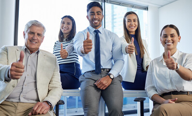 Poster - Keep doing what youre doing. Shot of a group of businesspeople showing thumbs up at the office.