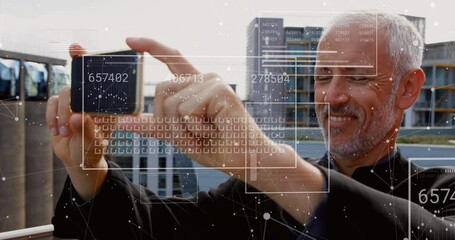 Poster - Animation of financial data processing over caucasian man using smartphone