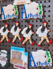 Wall Mural - View of traditional tourist souvenirs and gifts from Athens, Attica, Greece with fridge magnets with text 