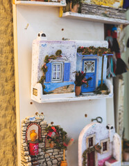 Wall Mural - View of traditional tourist souvenirs and gifts from Athens, Attica, Greece with fridge magnets with text 