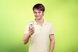 © BillionPhotos.com - Young happy teen man using mobile phone