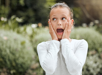 Poster - I didnt see that coming. Shot of an adorable little girl looking surprised while standing outside.