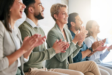 Sticker - That was a great presentation. Shot of a diverse group of businesspeople sitting in a row together and clapping.