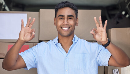 Poster - Your parcel is in safe hands with me, I promise. Portrait of a young delivery man gesturing an okay sign while loading boxes from a van.