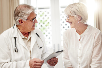Poster - Neither of you have to worry. Shot of a doctor and patient having a checkup at home.