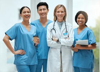Poster - Were always expecting you. Shot of a group of medical practitioners having a discussion in a hospital.
