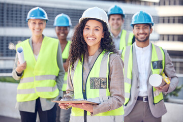Aufkleber - On site, on demand. Cropped shot of an attractive female construction worker standing outside on a building site with her colleagues.