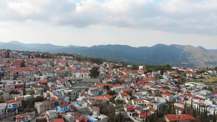 Wall Mural - Pano Lefkara, Cyprus - 10 th april, 2023: Aerial view The Church Of Holy Cross in Pano Lefkara, Cyprus. Famous travel destination in greek side of Cyprus