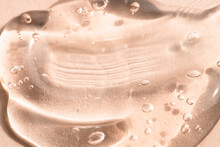 Aloe Vera Gel, Liquid Peptide, Hyaluronic Acid On A Beige Background. Cosmetic Texture Macro.