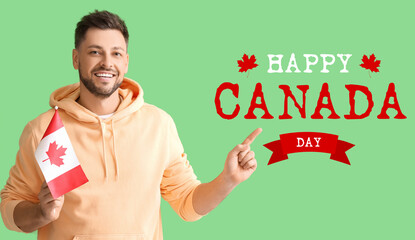 Poster - Man with Canadian flag on green background. Happy Canada Day