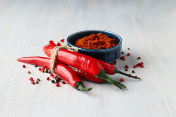 Wall Mural - Concept of hot and spicy ingredients - red hot chili pepper