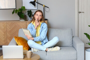 Poster - Thoughtful teenage girl with notebook at home