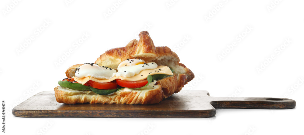 Wooden board with tasty eggs Benedict isolated on white background