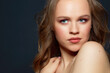 © lenets_tan - Portrait of beautiful woman model with fresh daily makeup and romantic wavy hairstyle.
