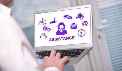 Wall Mural - Assistance concept on a laptop screen