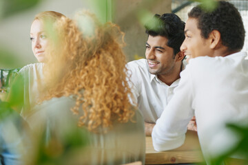 Aufkleber - Bringing brilliant minds together. Shot of a group of business people having a meeting in a cafe.
