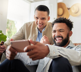 Canvas Print - Check out this cool new app. Shot of two men laughing while looking at something on a cellphone.