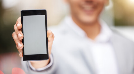 Poster - Ive got good news. Shot of an unrecognizable businessperson holding a phone in the city.