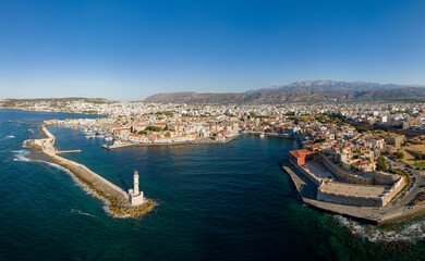 Canvas Print - Drone view of the old Venetian lighthouse guarding the entrance to the harbour in the Cretan city of Chania, Greece