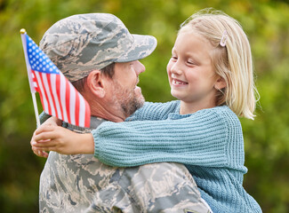 Wall Mural - All families are different and unique. Shot of a father returning from the army hugging his daughter outside.