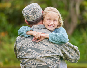 Wall Mural - A family that supports one another thrives. Shot of a father returning from the army hugging his daughter outside.